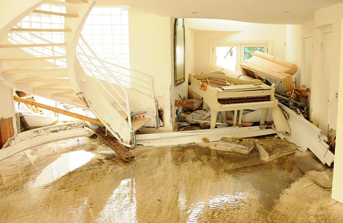 a flood water damage restoration service in action.